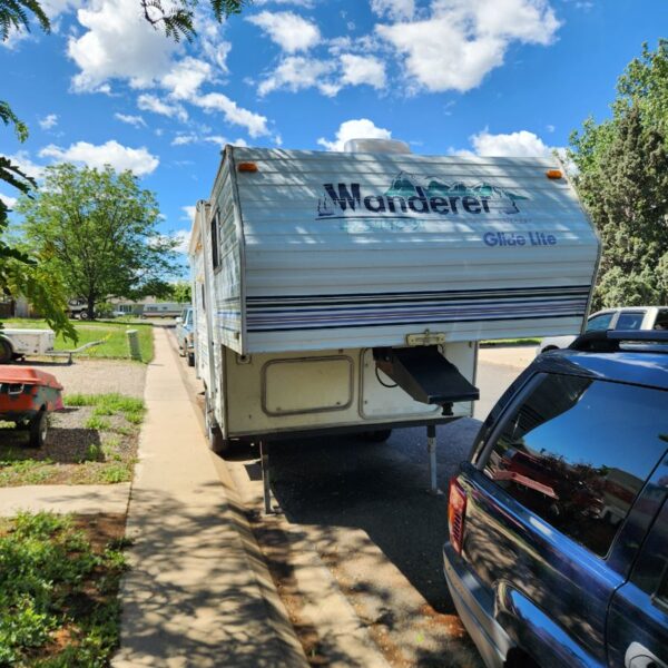 Wanderer Glide Lite Pop-Up Truck Camper — Fort Collins Junk Shop | Fort Collins Junk Removal & Demo